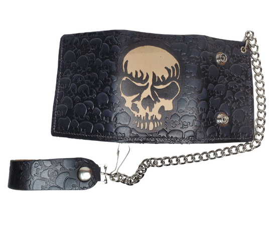 Skulls pattern all leather Tri-fold Chain Wallet. 1 Cash Slot for all your important stash, 3 card slots and 1 underneath the middle slot. It's USA made and Buckle and Hide approved. Approx. 3"x 4" folded. 2 snap closure. Complete with an 12" chrome plated chain including leather belt loop. Available in our Smyrna, TN shop a short drive from downtown Nashville. Like most wallets over stuffing will limit the time of use. Colors may vary from picture. 