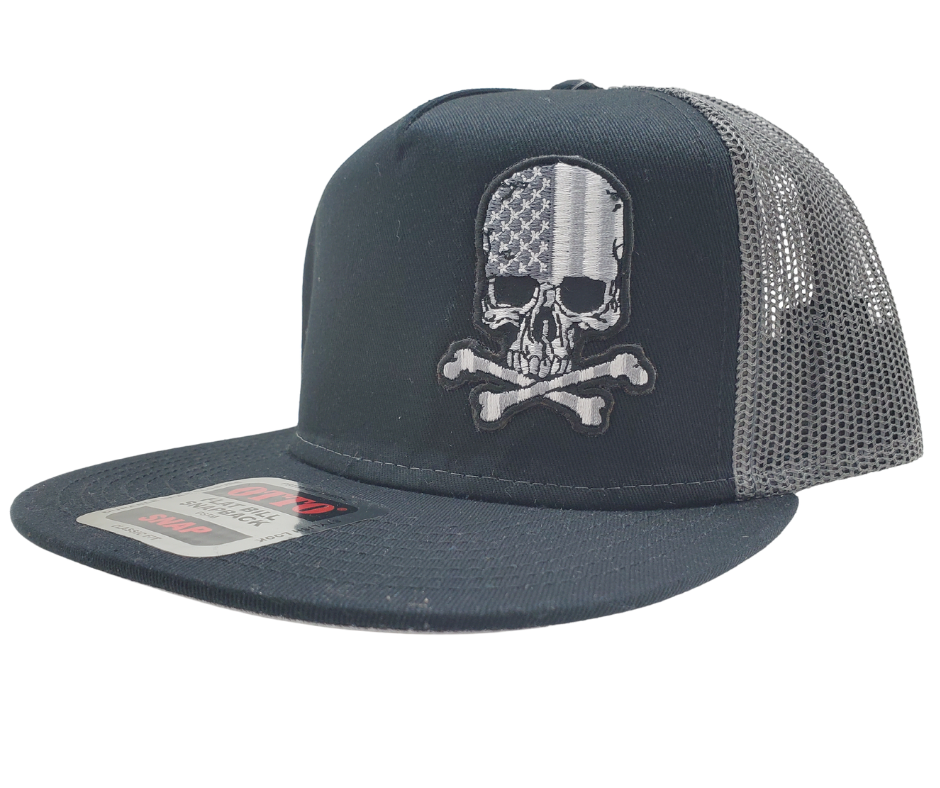 Black Flat Bill Cap with Gray mesh back. Front has a Silver embroidered patch of a skull graphic filled with the American Flag. Structured top to keep its shape. Sold at our shop just outside Nashville in Smyrna, TN.