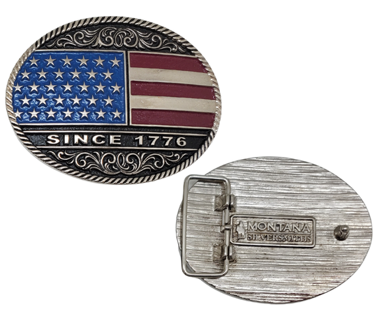 Be a true patriot with The "Declaration" Belt Buckle, featuring a timeless Western Scroll pattern, a rope edge, and iconic Red, White, and Blue colors. Its Antiqued silver finish and easy-to-wear oval shape make it a must-have for any belt measuring 1 1/2" wide. Find it online or at our shop near Nashville in Smyrna, TN. Crafted from durable metal alloy and coated with Montana Armor for long-lasting wear.