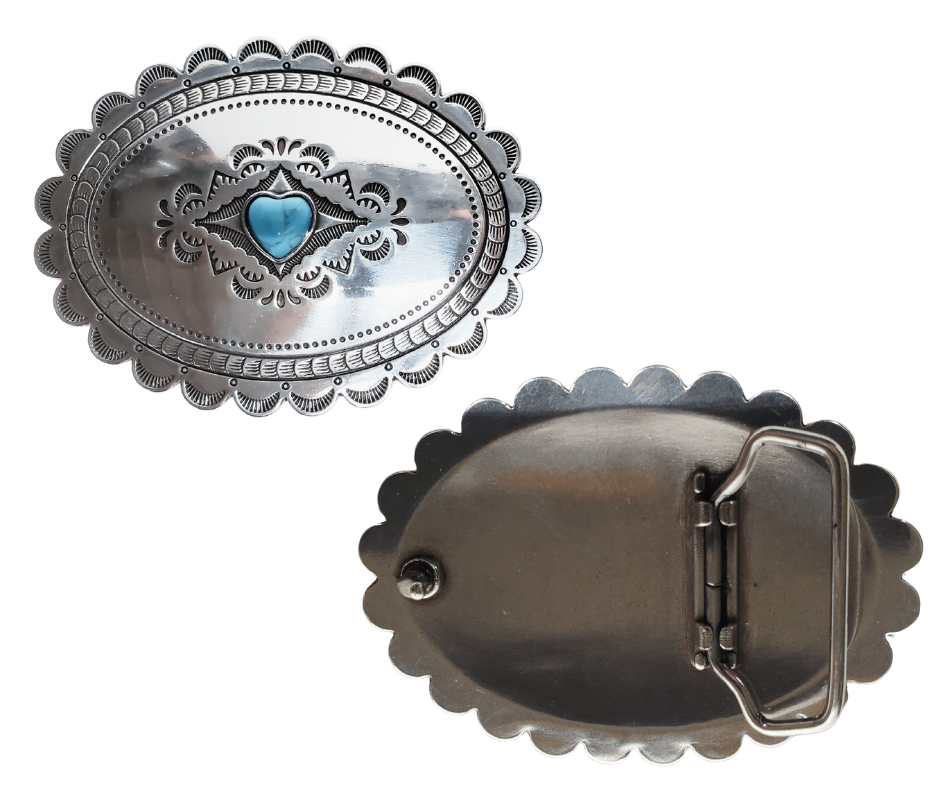 A southwest classic style oval Concho design that has a hand stamped appearance. The scalloped edge border sets it off around the edge. It is Antique silver in it's finish with a Small Heart shaped Turquoise colored stone in the center. with scroll design etched appearance on surface.  Measures approx. 3" tall by 4" wide and fits belts up to 1 1/2" wide.  It is available for purchase in our retail shop in Smyrna, TN, just outside Nashville and also on the online store. 