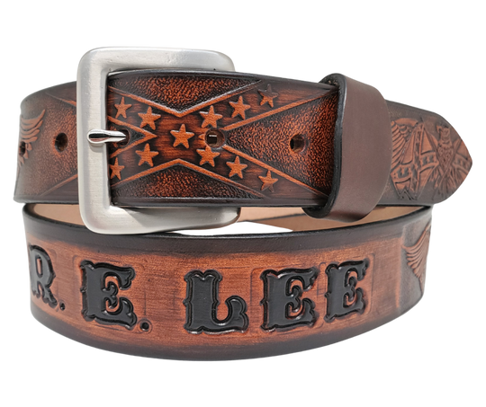 This Name Belt is one-of-a-kind Hand stained strip of vegetable tanned leather showcasing a Southern Heritage Eagles and Stars and Bars style pattern. Plus, the solid brass buckle in antique nickel finish can be easily switched out. Each belt is handcrafted at our shop in Smyrna, Tennessee, close to Nashville.