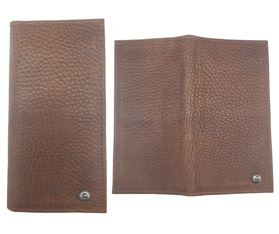 Fully Licensed Stetson Logo Roper/Checkbook style Wallet. Made from Genuine Bison Leather inside and out in a Classic Roper Design. Featuring on the right inside 6 card slots and I.D. pocket along with 2 underside pockets. On the left inside 1 cash pocket. In stock at our Smyrna, TN retail store 30 min. from downtown Nashville. Imported.