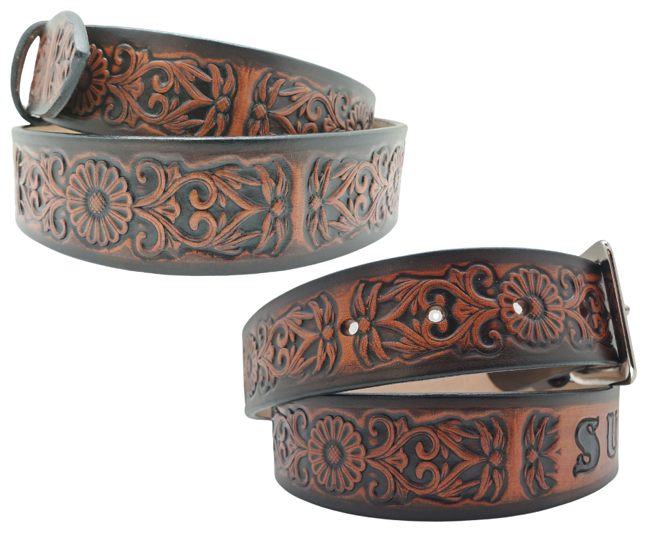 "The Sun Daisy" is a handmade real VEGTAN belt made from a single strip of cowhide shoulder leather that is 8-10 oz. or approx. 1/8" thick. It has hand burnished (smoothed)&nbsp;edges and Summer flowers embossed on the surface.&nbsp;The antique nickel plated solid brass buckle is snapped in place with heavy snaps.&nbsp; This belt is made just outside Nashville in Smyrna, TN.