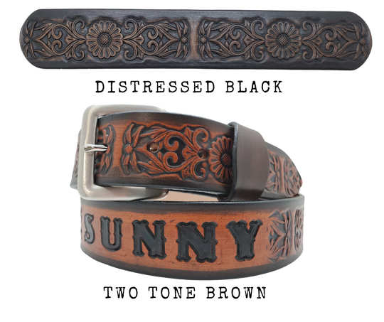 "The Sun Daisy" is a handmade real VEGTAN belt made from a single strip of cowhide shoulder leather that is 8-10 oz. or approx. 1/8" thick. It has hand burnished (smoothed)&nbsp;edges and Summer flowers embossed on the surface.&nbsp;The antique nickel plated solid brass buckle is snapped in place with heavy snaps.&nbsp; This belt is made just outside Nashville in Smyrna, TN.