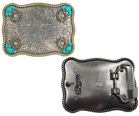 Sunsets are a divine gift. The "Sunset Flower" Belt Buckle takes your mind to one. Its rectangular shape, rope edge, and western floral background are accented by small Turquoise stones and Copper flowers. At 2 1/2" tall by 3 1/2" wide, this versatile buckle fits belts up to 1 1/2" wide and is available at our retail store in Smyrna, TN, near Nashville. We can't wait for you to see it!