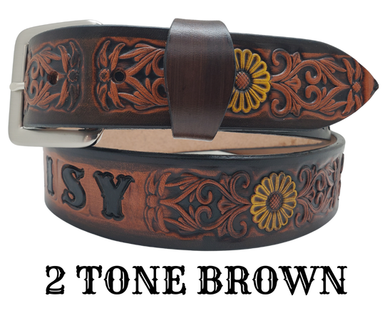 "The Sun Daisy" is a handmade real VEGTAN belt made from a single strip of cowhide shoulder leather that is 8-10 oz. or approx. 1/8" thick. It has hand burnished (smoothed)&nbsp;edges and Summer flowers embossed on the surface with HAND PAINTED in White and Yellow or White or Yellow. The antique nickel plated solid brass buckle is snapped in place with heavy snaps.&nbsp; This belt is made just outside Nashville in Smyrna, TN.