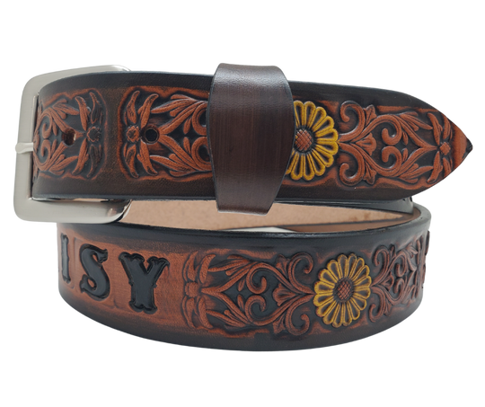 "The Sun Daisy" is a handmade real VEGTAN belt made from a single strip of cowhide shoulder leather that is 8-10 oz. or approx. 1/8" thick. It has hand burnished (smoothed)&nbsp;edges and Summer flowers embossed on the surface with HAND PAINTED in White and Yellow or White or Yellow. The antique nickel plated solid brass buckle is snapped in place with heavy snaps.&nbsp; This belt is made just outside Nashville in Smyrna, TN.