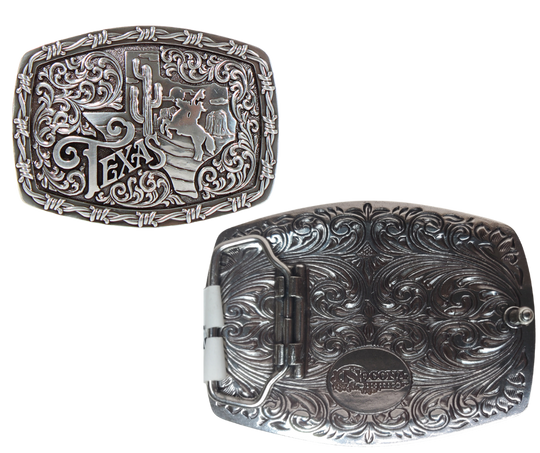 This "Texan" Western Buckle by Nocona has it all--barbed-wire borders, an oval/rectangular shape, a Lone Star State silhouette, a cactus, and a horse rider for good measure! Plus, the Scroll design gives it an extra bit of flair. The buckle is rustic with it's antique silver finish, and measures 2 1/2" tall by 3 1/2" wide, fitting belts up to 1 1/2" wide. You can get your hands on this one in our Smyrna, TN retail store (near Nashville) and through the convenience of our online store! Imported