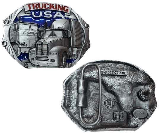 The American Trucker buckle part of our First Responders and Trades series we've added. Bless our men and women who put their life on the line for us everyday! Complete with Semi Truck cab, American flag shield and Eagles  designs. Pewter belt buckle that may be attached to your belt.  Fits 1 1/2" belts, Size approx. 3-1/2" x 2-3/4. Available in our shop just outside Nashville in Smyrna, TN.