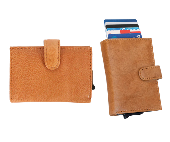 The Nova Auto Pop-Up Wallet is available at our Smyrna, TN shop. A minimalist design and practicality. Made from premium full-grain leather. It offers ample storage for up to 8 cards, an ID, bills, and coins. The unique auto pop-up mechanism allows quick access to your cards with a simple push, while built-in RFID protection keeps your personal information secure.

Wallet Dimensions:&nbsp;4" L x 3" H x .75" D