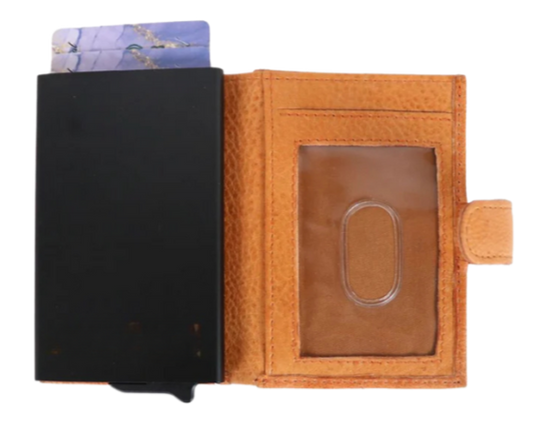 The Nova Auto Pop-Up Wallet is available at our Smyrna, TN shop. A minimalist design and practicality. Made from premium full-grain leather. It offers ample storage for up to 8 cards, an ID, bills, and coins. The unique auto pop-up mechanism allows quick access to your cards with a simple push, while built-in RFID protection keeps your personal information secure.

Wallet Dimensions:&nbsp;4" L x 3" H x .75" D