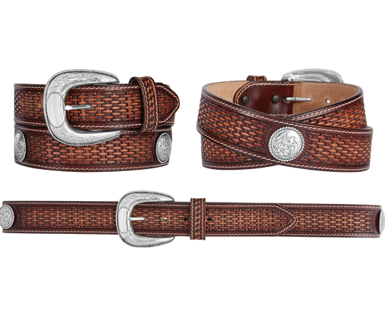 The beauty of this Basket weave belt is the white border stitching and Faded brown to tan center colors that bring out its rich textural pattern. A Silver colored Conchos and buckle echoes the design on the strap. Proudly handcrafted in the USA with imported materials. Belt is 1 1/2" wide and has snaps for simple buckle change. Available at our Smyrna, TN shop just outside Nashville.  Made in USA by Brighton for Tony Lama.