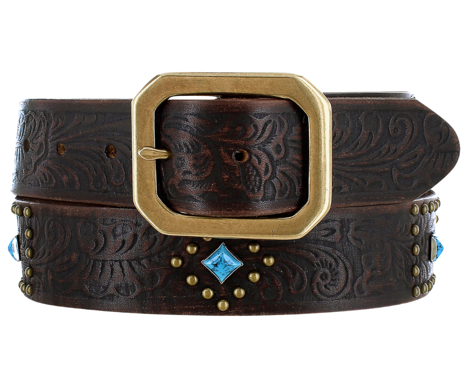 The rich leather belt strap has Western pattern floral embossing in dark brown accented with small round gold studs in a Diamond shaped pattern, a diamond shaped Turquoise colored stone, completed with a Clipped corner square buckle. It has snaps for easy buckle change. This chocolate brown color will match and go with a lot of boots and outfits and is available at our Smyrna, TN shop not far from Nashville.