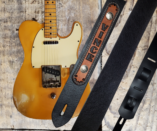 Great Musicians, Singers and great songs have been a staple for years in Nashville. Be on your way starting your journey with this 2"main Body of the Guitar strap is approx. 1/8" thick with a 2 Buffalo Nickels, CUSTOMIZABLE NAME FONT and Patch color. The classic adjustment style goes from approx. 42" to 56" at it's longest . Made just outside Nashville in our Smyrna, TN. shop. It will need a bit of time to "break in" but will get a great patina over time.  