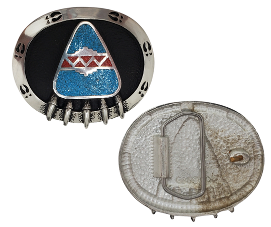 Show some Native American appreciation with this pewter belt buckle, highlighted with enamel and stone chips, perfect for 1 1/2" belts. Measuring 2-3/4" wide and 2-1/4" tall, it's available in our shop located just outside of Nashville in Smyrna, TN.