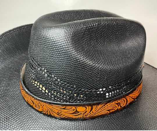 <p>A classic Western Styled pattern <b><i>Hand Stained</i></b> leather hatband. Band is 1" wide will fit up to size 7 1/2 hat. Matches our Rustler Belt. Fit's most any hat with adjustable bead and leather 1/8" string. Will fit most WESTERN crowned hats. Made in our Smyrna, TN. shop a short drive from downtown Nashville, TN.</p> <p>&nbsp;</p>