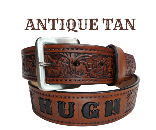 This solid strip of Veg Tan cowhide, is hand stained in 3 brown options, with smooth, finished edges. Embossed with Deer, Mountain Lion, and Duck scene down length of belt, or have name added to scene up to 8 letters. Belt thickness is approx. 1/8", and 1 1/2" wide. Sizes available are 34" to 44" from buckle end to hole most worn. Attached with 2 snaps is a Brushed Nickel plated solid brass buckle. Handmade in our Smyrna, TN, USA shop a short trip from Nashville.