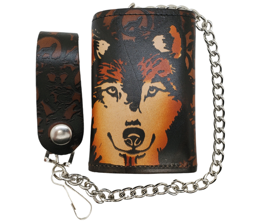 Wolf "all over" pattern Leather Patch all leather Tri-fold Chain Wallet. 1 Cash Slot for all your important stash, 3 card slots and 1 underneath the middle slot. It's<em data-mce-fragment="1"><strong data-mce-fragment="1">&nbsp;USA made&nbsp;</strong></em><span>and Buckle and Hide approved. Approx. 3"x 4" folded. 2 snap closure. Complete with an 12" chrome plated chain including leather belt loop. Available in our Smyrna, TN shop a short drive from downtown Nashville. </span>