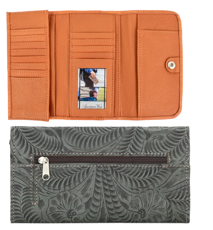 Full grain leather tri-fold wallet hand-stained, boasting a wild western floral hand-tooled pattern. Snappily close it with the spring snap and store your coins in the back zippered pocket. Inside the wallet, you'll find 12 credit card slots, an ID spot, multiple currency stations, and a checkbook flap! Plus, with the cotton linen dividing the pockets, it stays lightweight. Collect yours from our Smyrna, TN spot near Nashville!