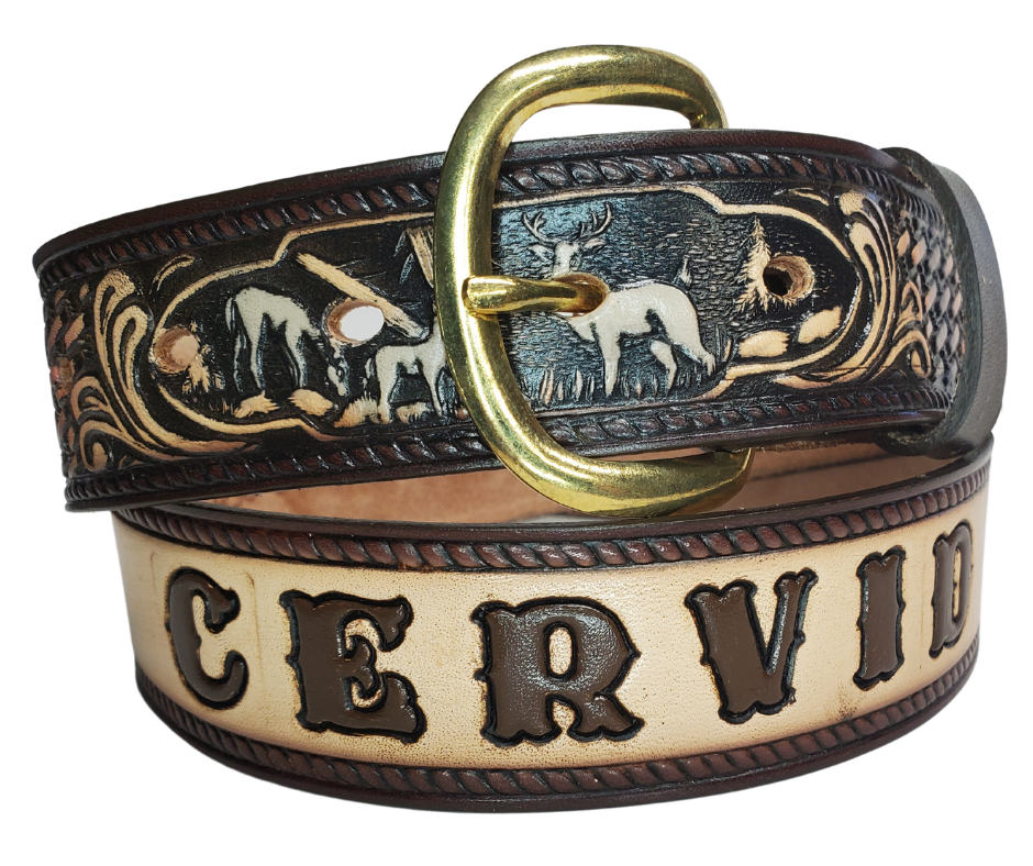 The Stag, Doe, Fawn leather belt is a classic Outdoors Pattern with DEER Family or the "Cervid".   Perfect the Outdoors lover in your family. Available in a 1 1/2" width. Full grain vegetable tanned cowhide, Width 1 1/2" and includes Nickle plated  buckle Smooth burnished painted edges. Made in USA! For name Type name desired on belt in "Type Name Here" section, no more than 9 LETTERS maximum on this PARTICULAR belt. Buckle snaps in place for easy changing if desired. In stock at our Smyrna, TN shop.