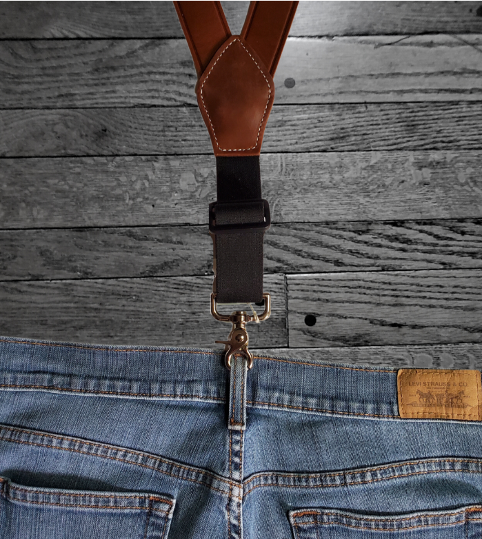 Our USA-made by 3D. Leather suspenders are the perfectly stylish accessory for your wardrobe. The main leather straps are 1 3/8" and taper to 3/4". Buckle adjustment and elastic back and scissor style clips for easy attachment to pants. Stocked in our Smyrna, TN store 20 miles from Nashville. 