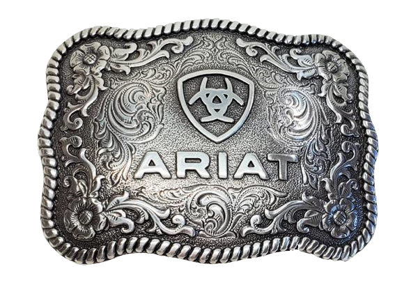 This rectangular shaped buckle has rounded edges and Ariat logo centered on surface. Surface also has scroll and flower designs and rope design around the border of the buckle. Color is antique chrome. Measures 2 1/2" tall by 3 1/2" wide. Fits belts up to 2" wide. Available for purchase in our online store or the retail shop in Smyrna, TN, just outside Nashville. Made in Taiwan.