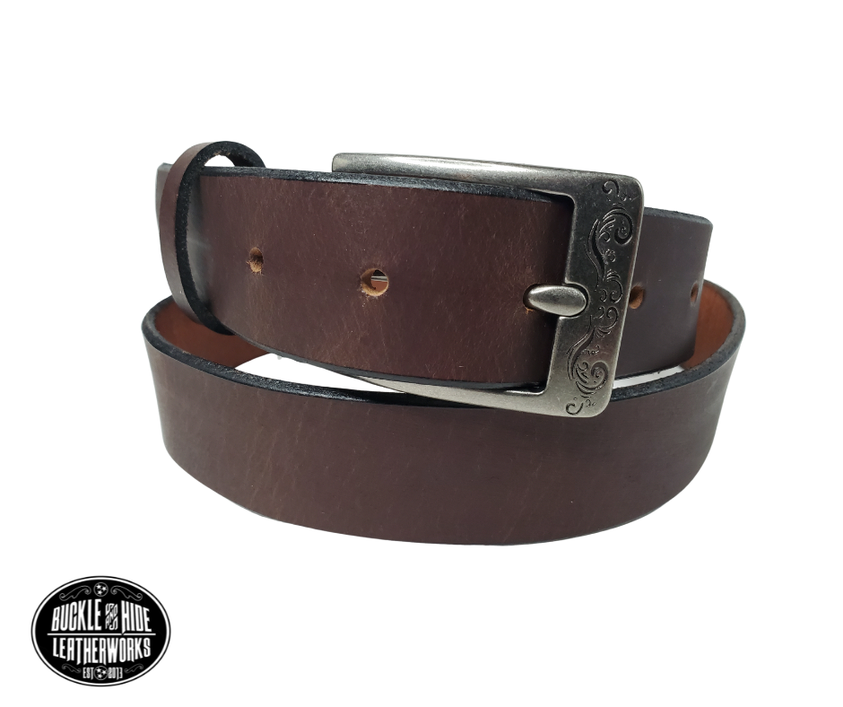 "The Central City" handmade, real leather belt is made in our Smyrna, TN shop just outside Nashville.  The process starts with cowhide, which is cut into strips. The removable antique silver colored buckle is attached with snaps, you may add your own or purchase a theme buckle to personalize the look.  Please see sizing instructions to make sure you have the desired fit. 