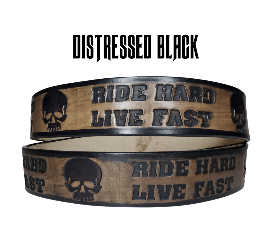 "The Daytona" is a handmade real leather belt made from a single strip of cowhide shoulder leather that is 8-10 oz. or approx. 1/8" thick. It has hand burnished (smoothed) edges and features the mantra "RIDE HARD LIVE FAST" and an HD Skull pattern down the center. This belt is completely HAND dyed with a multi step finishing technic. The antique nickel plated solid brass buckle is snapped in place with heavy snaps.  This belt is made just outside Nashville in Smyrna, TN.