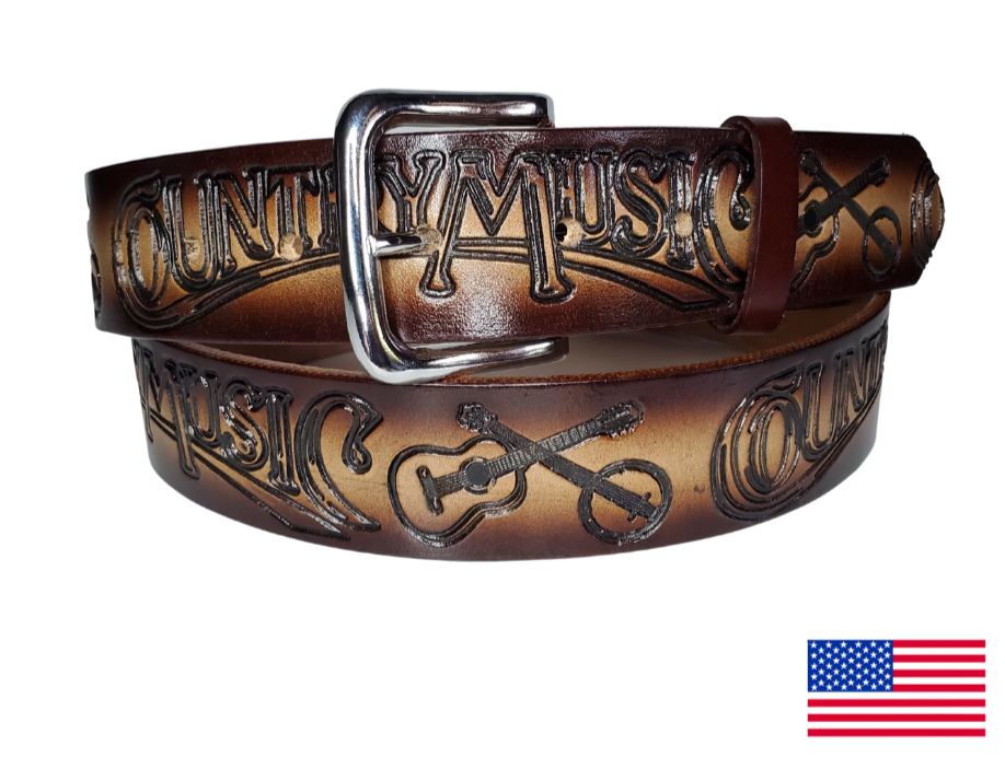 This USA made veg-tan leather belt is approx. 1/8" thick, 1 1/2"width with no fillers to split or rip apart. The belt features Guitar, Banjos with COUNTRY MUSIC embossed around the entire belt. The color has a Dark Brown edge faded into a Natural colored center. The leather is comfortable from day one   Buckle is snapped on for easy buckle change. Colors may vary do to the manufacturing process. We don't make this belt but it's Buckle and Hide approved and still made in the USA. 