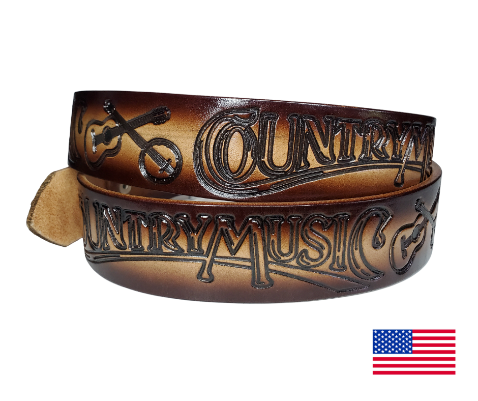 This USA made veg-tan leather belt is approx. 1/8" thick, 1 1/2"width with no fillers to split or rip apart. The belt features Guitar, Banjos with COUNTRY MUSIC embossed around the entire belt. The color has a Dark Brown edge faded into a Natural colored center. The leather is comfortable from day one   Buckle is snapped on for easy buckle change. Colors may vary do to the manufacturing process. We don't make this belt but it's Buckle and Hide approved and still made in the USA. 