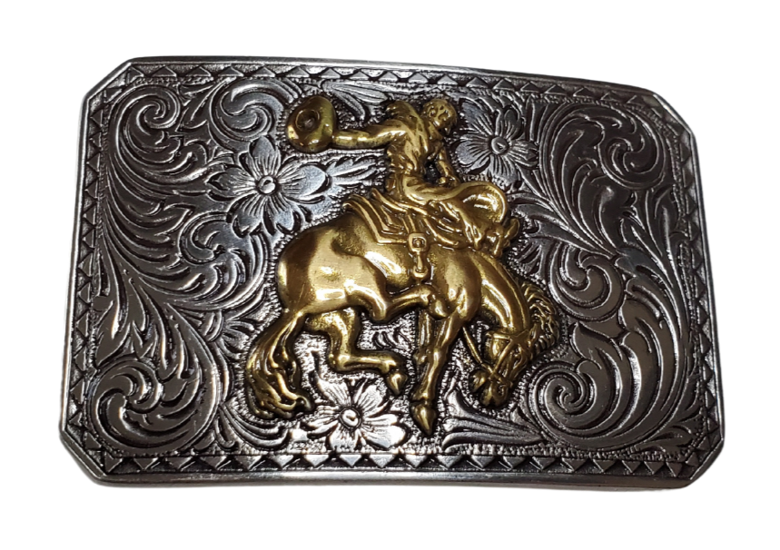 Rectangular antique silver colored belt buckle with Western scrolled design and a Bronc Rider Motif, size approx. 3" wide by 2 1/2" tall. Available online and at our shop just outside Nashville in Smyrna, TN. Imported