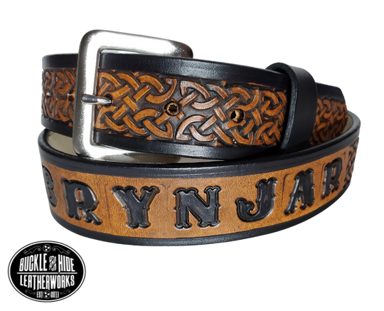 "The Magnus" is a handmade real leather belt made from a single strip of cowhide shoulder leather that is 8-10 oz. or approx. 1/8" thick. It has hand burnished (smoothed) edges and the Classic knotted Celtic pattern. This belt is completely HAND dyed with a multi step finishing technic. The antique nickel plated solid brass buckle is snapped in place with heavy snaps.  This belt is made just outside Nashville in Smyrna, TN.