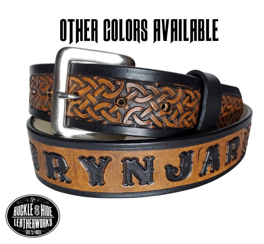 "The Magnus" is a handmade real leather belt made from a single strip of cowhide shoulder leather that is 8-10 oz. or approx. 1/8" thick. It has hand burnished (smoothed) edges and the Classic knotted Celtic pattern. This belt is completely HAND dyed with a multi step finishing technic. The antique nickel plated solid brass buckle is snapped in place with heavy snaps.  This belt is made just outside Nashville in Smyrna, TN.