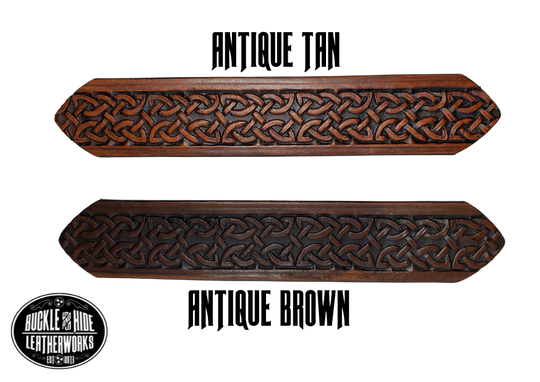 "The Magnus" is a handmade real leather belt made from a single strip of cowhide shoulder leather that is 8-10 oz. or approx. 1/8" thick. It has hand burnished (smoothed) edges and the Classic knotted Celtic pattern. This belt is completely HAND dyed with a multi step finishing technic. The antique nickel plated solid brass buckle is snapped in place with heavy snaps.  This belt is made just outside Nashville in Smyrna, TN.