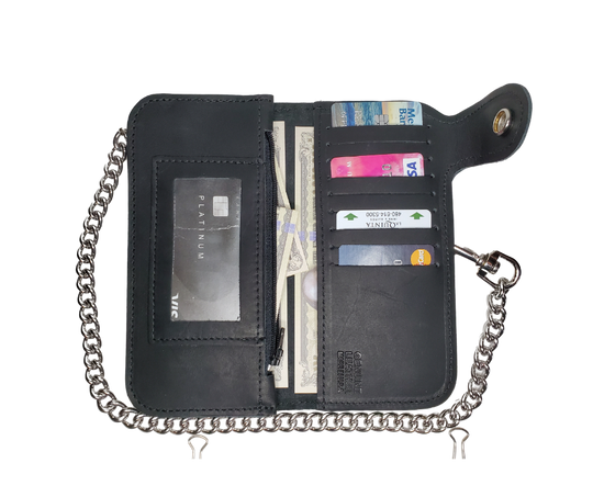 With cards for almost everything, now, the "Prospect" chain wallet delivers. This wallet has 2 sections that are like the traditional chain wallet, with extra slots for the many cards that seem to multiply!  3 cash pockets and I.D. slot 9 credit card slots&nbsp; Basic 12" Chain included Made in USA Black leather Dimensions folded 3 1/2" x 7" open 7" x 7"