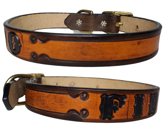 The Fido Dog Collar is made from the same 9/10 oz./approx, 1/8" thick leather that all of our NAME belts are made from.  This one is Hand Stamped instead of Embossed like our other Dog Collars. We make these in a 1" width in sizes 15"-19" and 1 1/4" width 21"- 25". The center bar style buckle and D ring are Solid Brass. Your dogs Name is embossed in a 3/4" size font and is finished in our popular Two Tone Brown.  These also may be ordered in person in our Smyrna, TN shop. 