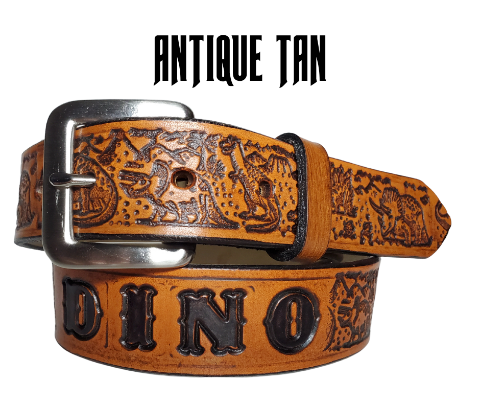 Our Lil Dino is perfect who love Dinosaurs! Full grain American vegetable tanned cowhide approx. 1/8"thick. Width is 1 1/4" and includes Antique Nickle plated Solid Brass buckle. We Hand Finish with each belt. Edges are smooth burnished painted edges. Made in our Smyrna, TN, USA shop. Buckle snaps in place for easy changing if desired.  Choose with or without name