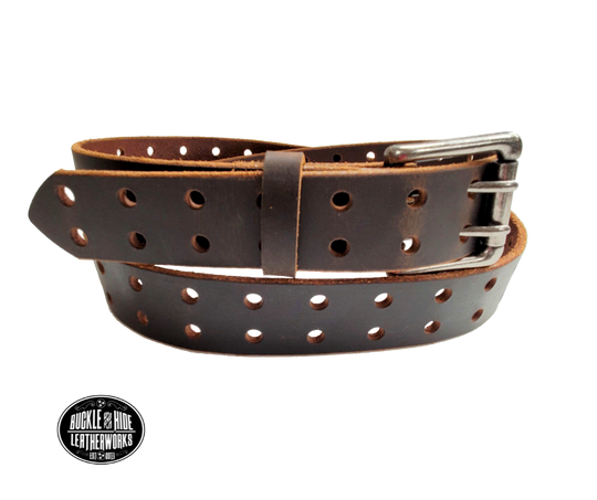 Our double pin roller belt features a single strip of genuine top grain leather. The leather is comfortable from day one and features double holes the entire length of the strap!   The antique nickel plated roller buckle is easy on the leather; the roller functions to protect the strap from undue creasing and scratching.  Buckle is riveted to leather strap. Handmade in our shop just outside Nashville in Smyrna, TN.