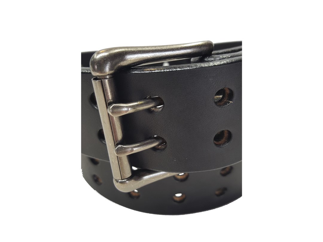 Our handmade Extra Heavy double hole leather belt is made from 12-14 oz. (approx 1/4" thick) bridle cowhide leather that is drum dyed all the way through. The double holes run the length of the belt. Buckle is a heavy double pronged roller buckle with antique nickel plated finish that is snapped in place on the end.  The width is 1 3/4", edges are smoothed and painted.  Made just outside Nashville in Smyrna, TN.  Available in black or brown.