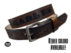 This Eagle Mesa Name Leather Belt offers a unique homage to the American Wild West. Crafted from top-quality Veg tan cowhide and featuring a detailed Eagle-over-desert embossing, this belt is a stylish and practical choice. It's even customizable with name and multiple finish options. Handmade near Nashville in Smyrna TN.