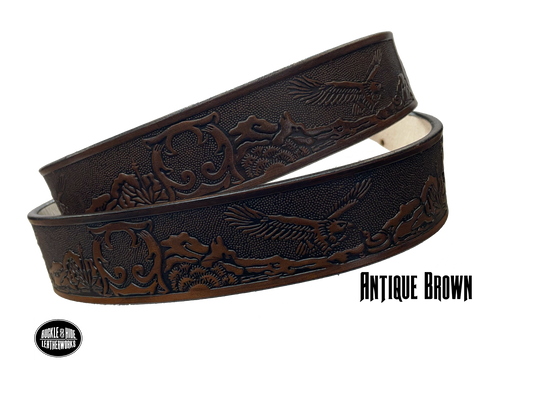 Full grain American vegetable tanned cowhide approx. 1/8"thick. Width 1 1/2" and includes Antique Nickle plated Solid Brass buckle Hand Finished in 3 color options Smooth burnished painted edges Choose with or without name, if without name, design will cover entire length of belt For name Type name desired on belt in "Type Name Here" section, no more than 8 letters maximum Buckle snaps in place for easy changing if desired Made in our Smyrna, TN, USA shop Belt Sizing Instructions