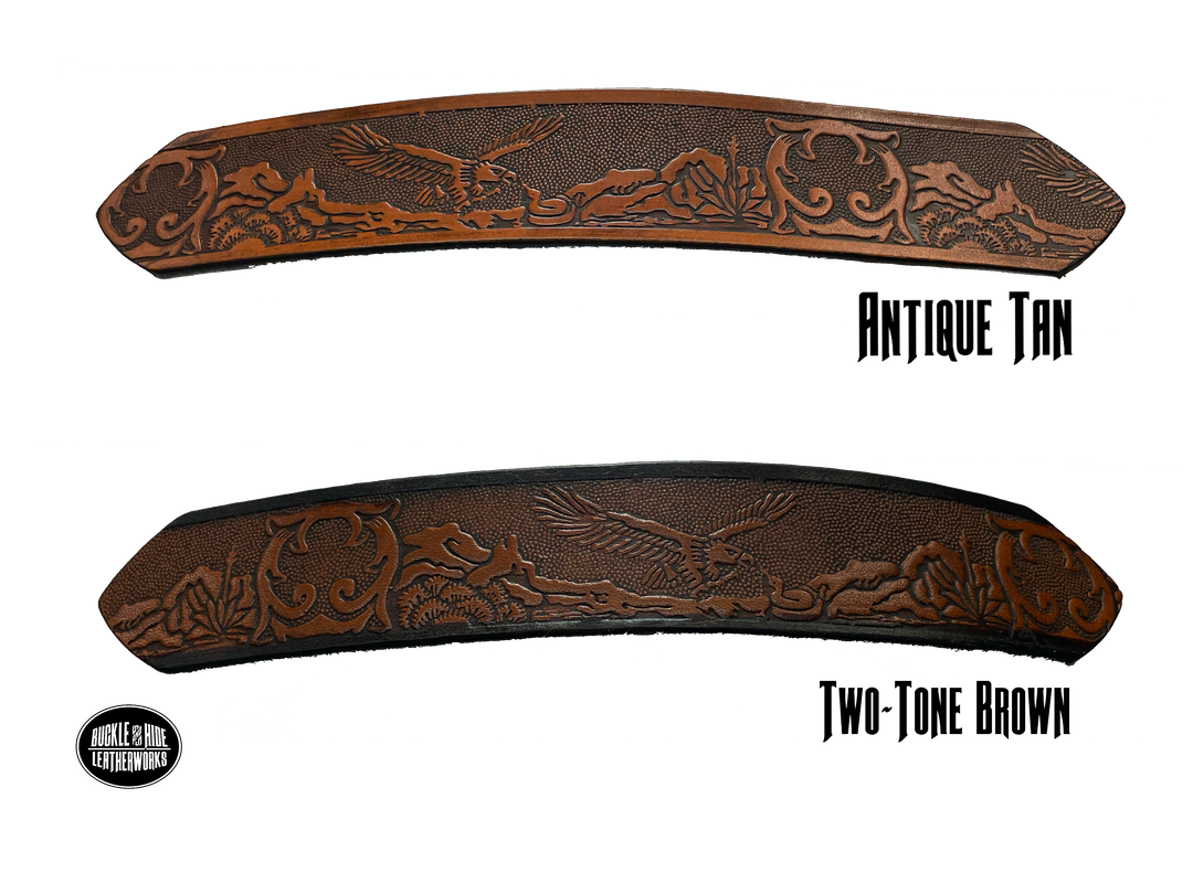 This Eagle Mesa Name Leather Belt offers a unique homage to the American Wild West. Crafted from top-quality Veg tan cowhide and featuring a detailed Eagle-over-desert embossing, this belt is a stylish and practical choice. It's even customizable with name and multiple finish options. Handmade near Nashville in Smyrna TN.