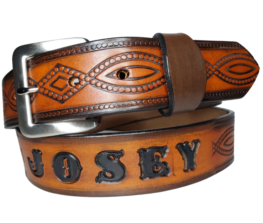 "The Good, Bad, and the Ugly" is a professionally crafted, genuine leather belt made from 8-10 oz cowhide shoulder leather, approximately 1/8" thick. It boasts a hand burnished edge, Diamond center, and rope edge pattern, along with a multi-step dye and finishing technique. The antique nickel plated solid brass buckle is affixed with heavy snaps. This belt is crafted near Nashville, TN in Smyrna.