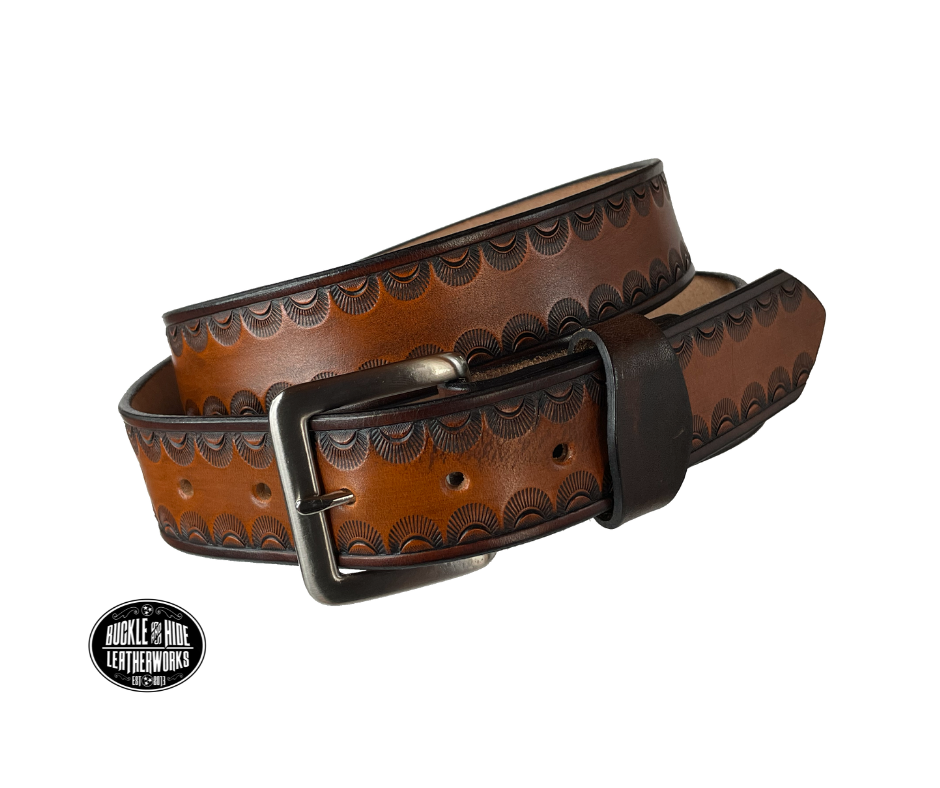 "The Jackson" handmade all leather belt is made from a single strip of Veg-tan cowhide or drum dyed (colored all the way through) Black cowhide shoulder leather.  The Two tone brown is a hand finished Veg-tan that is 9-10 oz., or approx. 1/8" thick.  The width is 1 1/2".   The antique nickel plated solid brass buckle is snapped in place. This belt is made just outside Nashville in Smyrna, TN. Perfect for casual and dress wear, it can be for personal use or for groomsman gifts or other gifts as well. 