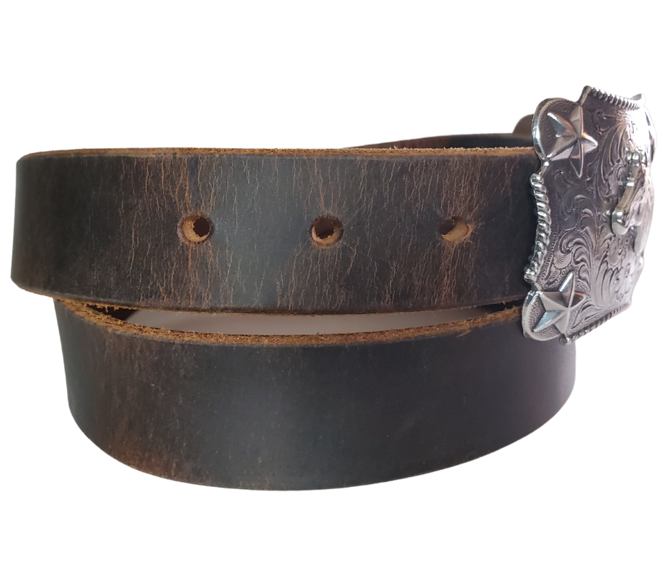 Our Kids/Youth Belt Combo is a great choice who's wants to be like dad or mom! Belt leather that is approx. 1/8"thick. The width is 1 1/4" and this Combo includes a 2" x 2 1/2" sized Western styled Nickle plated Rectangle shaped buckle with a Horsehead framed with Stars completed with a rope edge. Buckle snaps in place for easy changing if desired. Choose a Black or Distressed Brown Leather belt for the Combo. Made in our Smyrna, TN, USA shop. NO names on this belt.           