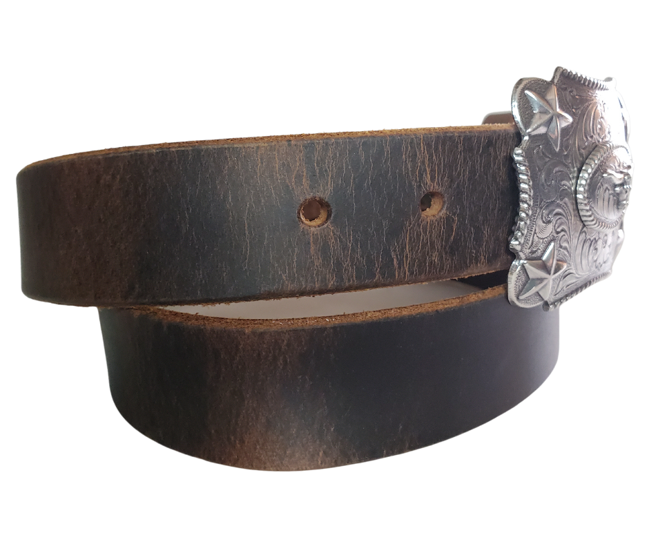 Our Kids/Youth Belt Combo is a great choice who's wants to be like dad or mom! Belt leather that is approx. 1/8"thick. The width is 1 1/4" and this Combo includes a 2" x 2 1/2" sized Western styled Nickle plated Rectangle shaped buckle with a Longhorn framed with Stars completed with a rope edge. Buckle snaps in place for easy changing if desired. Choose a Black or Distressed Brown Leather belt for the Combo. Made in our Smyrna, TN, USA shop. NO names on this belt. 