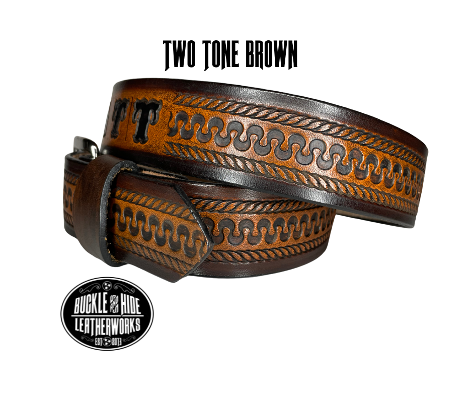 This belt's got some class! Embossed with a classic western serpentine/rope pattern and made with 1/8" thick Veg tan cowhide, the "Law Dawg" Name Leather Belt will give you the durability and style to last for miles and miles if you get a bit rowdy - It's made in our Smyrna, TN shop just outside Nashville, TN. Saddle up!