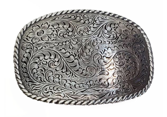 This rectangular shaped buckle by Nocona has rounded edges with rope design around the border. It is chrome colored with scroll design etched appearance on surface.  Measures 2 3/4" tall by 3 3/4" wide and fits belts up to 1 1/2" wide.  It is available for purchase in our retail shop in Smyrna, TN, just outside Nashville and also on the online store. Made in Taiwan.