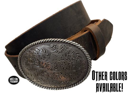 This oval shaped buckle has a rope design around the border. It is chrome colored with scroll design etched appearance on surface.  Measures 2 3/4" tall by 3 3/4" wide and fits belts up to 1 1/2" wide. Buckle is made in Taiwan. Belt is a solid strip of leather and made in our shop in Smyrna, TN, just outside Nashville. It is 1 1/2" wide and available in sizes 34"-44" and colors distressed brown, black, and dark brown. ﻿It is available for purchase in our retail shop and online store. Main photo.