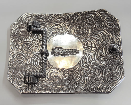 Nocona Western buckle with longhorn steer design Dimensions 2 3/4" tall by 3 3/4" wide Great for accentuating the Western look of your wardrobe Available online and in our shop in Smyrna, TN, just outside of Nashville. back of buckle pictured